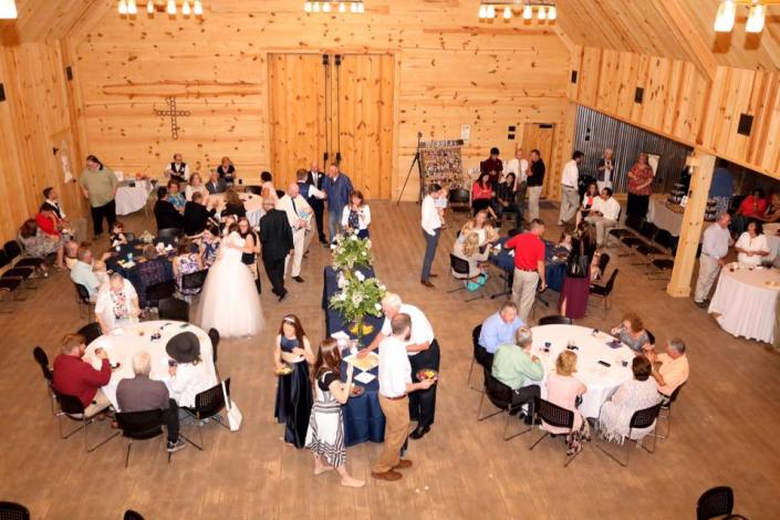 With high vaulted ceilings accompanied with rich wood floors and beams, creates a scenic atmosphere for wedding receptions! 