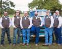 These groomsmen depict a stylish, rustic appeal posing in front our antique truck! 