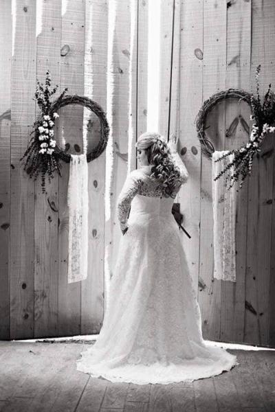 Our rustic barn doors create the perfect backdrop for stunning wedding photos! 